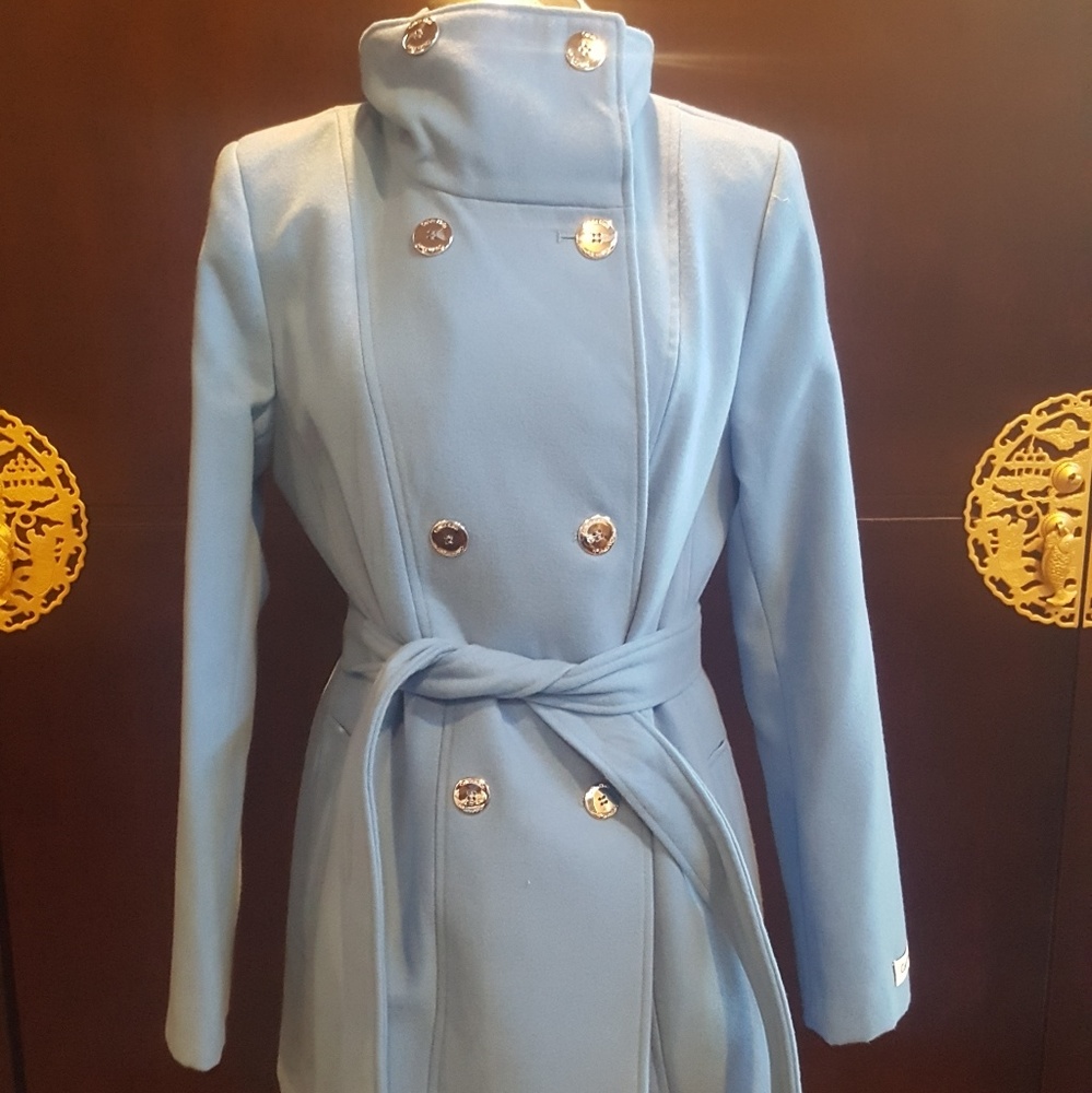 Blue coat with silver buttons very chic